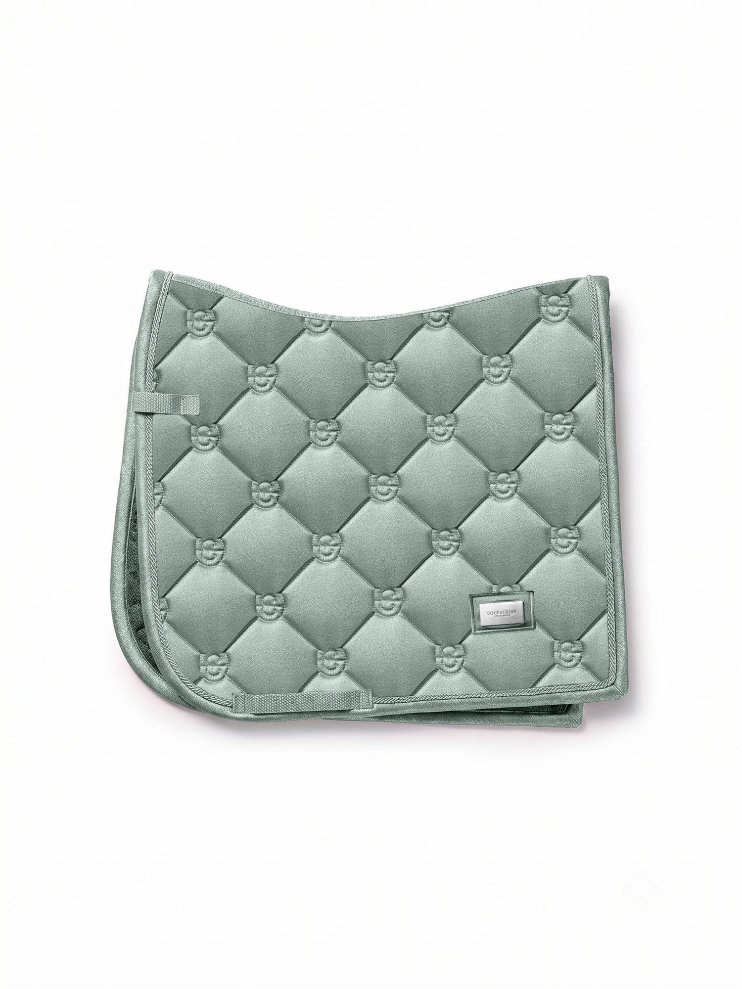 Studio image of Equestrian Stockholm Dressage Saddle Pad Glow Mist Green with ES quilting and silver piping.
