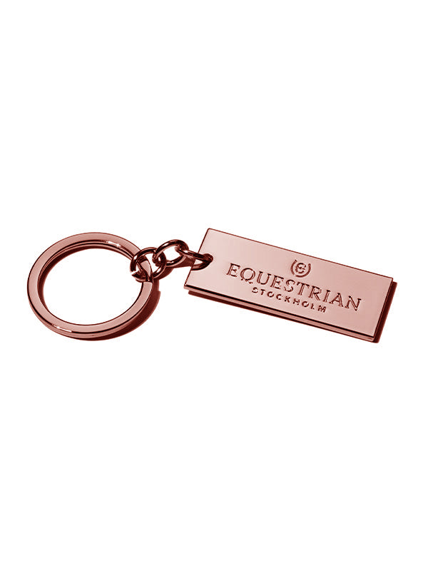 Studio image of portachiavi Equestrian Stockholm Rose in oro rosa lucido con logo inciso.