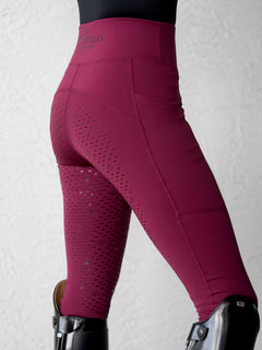 Studio image of Equestrian Stockholm Riding Tights Movement Merlot with a high waistband and full seat silicone grip.