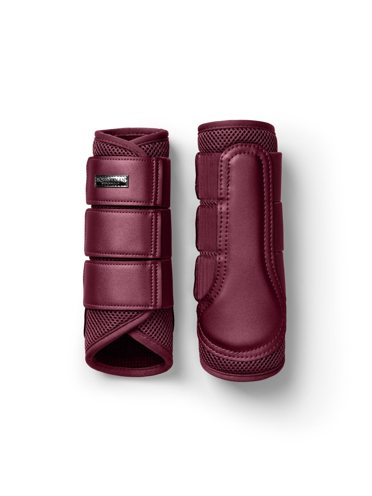 Studio image of Equestrian Stockholm Mesh Brushing Boots in Merlot with 3D mesh, black logo badge, and Velcro straps.