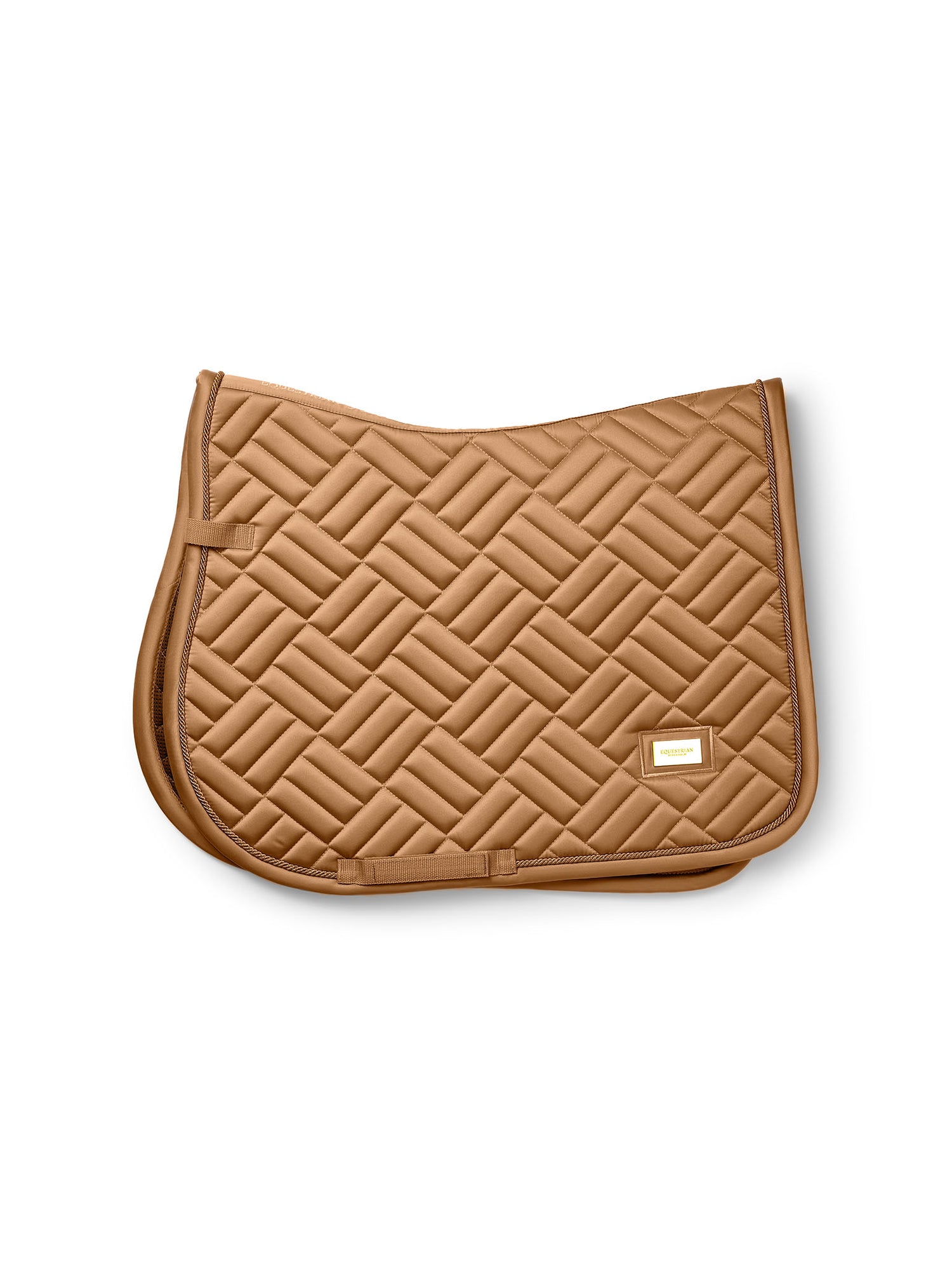 Studio image of Equestrian Stockholm Jump Saddle Pad Modern Savannah Glow in beige with modern quilting and gold badge.