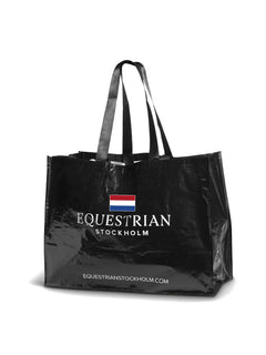 Studio image of black Equestrian Stockholm Woven Stable Bag The Netherlands with a Dutch flag and white logo