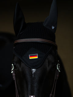 Equestrian Stockholm Ear Bonnet Cotton Black Germany with flag badge and silver logo on a black horse wearing a bridle.