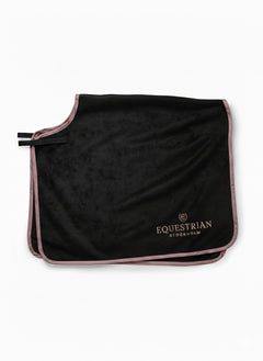 Studio image of Equestrian Stockholm Heavy Fleece Quarter Blanket in black with blush pink trim and rose gold logo.